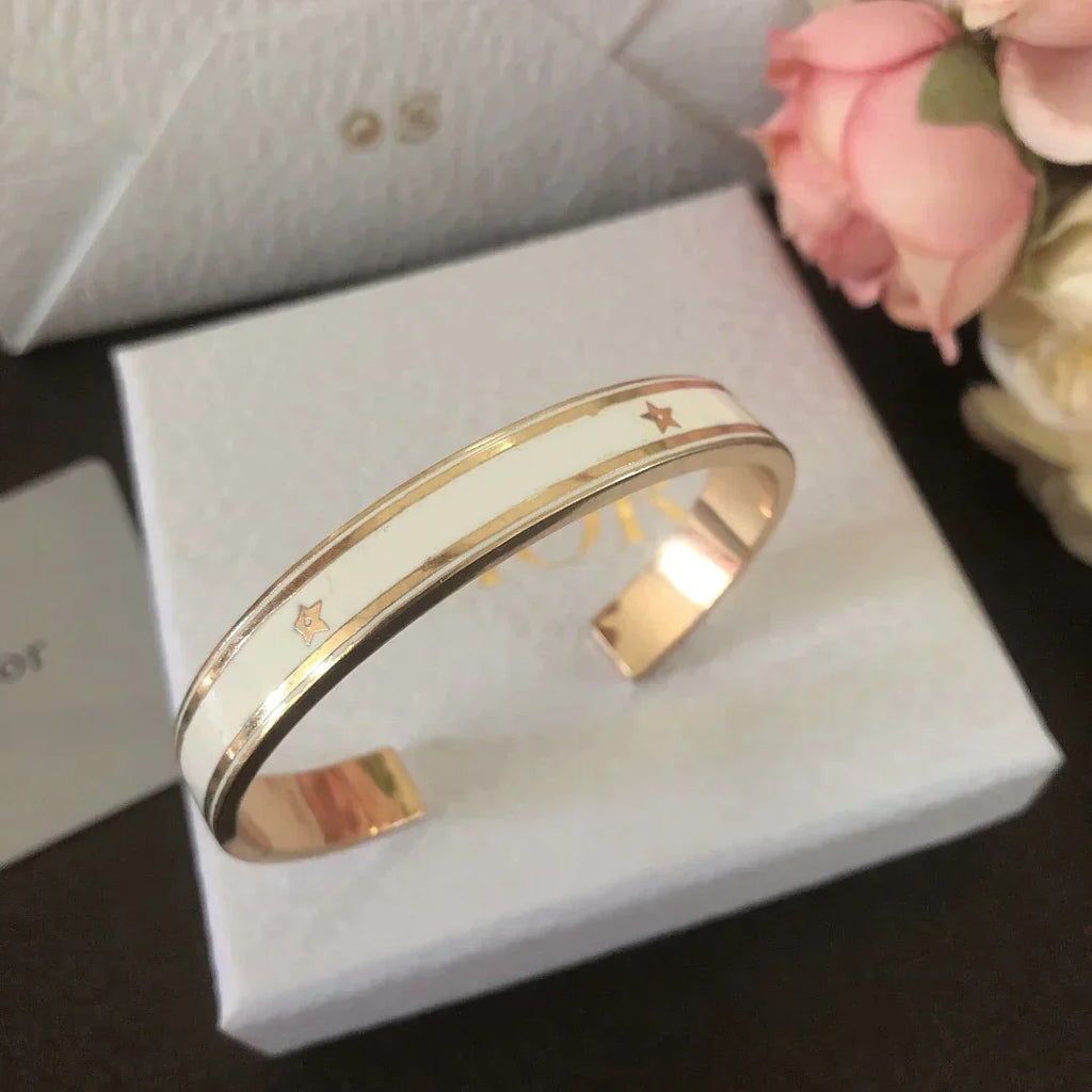 DIOR CODE BANGLE GOLD-FINISH METAL AND LACQUER WOMEN